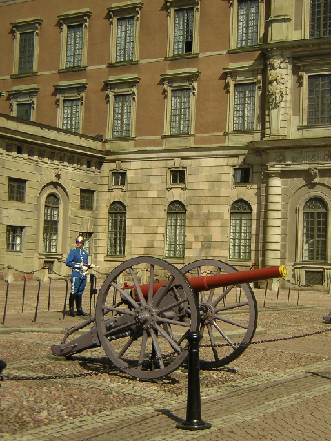 Stockholm - young soldier and cannon at the royal palace